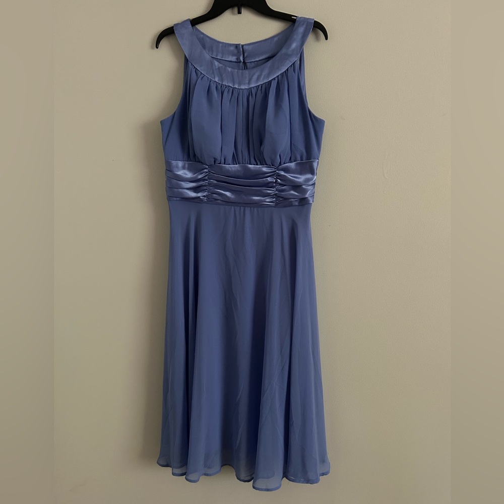 Flared dress. Made of veil and satin. Romantic style. For any occasion.